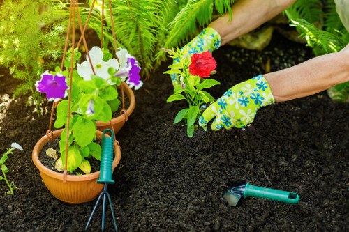 Gardeners Leaves Green team working safely in a garden